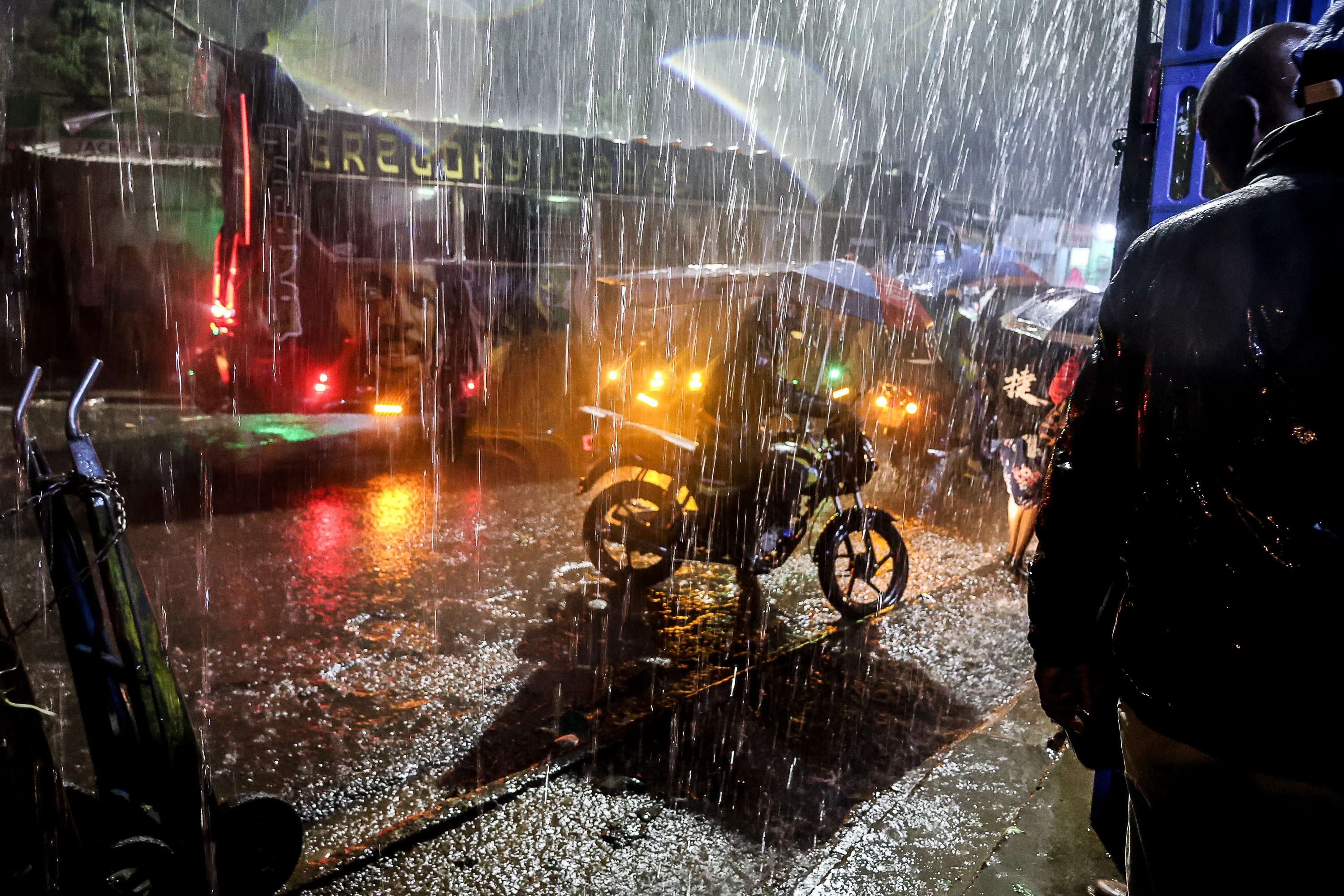 Even without the interference of El Niño, Nairobi, Kenya is prone to flooding. Above: Motorists drive through heavy rains in the Kibera community on March 14. Flooding that month took over 100 lives in the capital city.