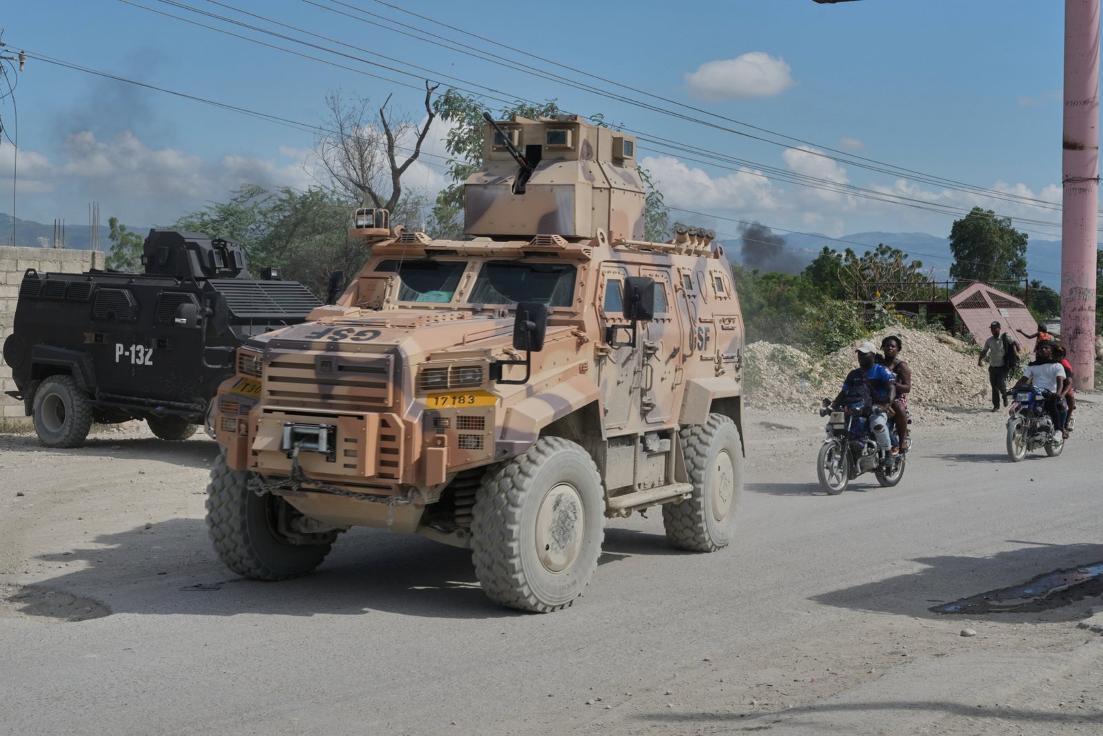 Armored police vehicles that are part of the Gang Suppression Force (GSF) patrol the Tabarre neighborhood of Port-au-Prince, Haiti, Monday, Oct. 19, 2026.