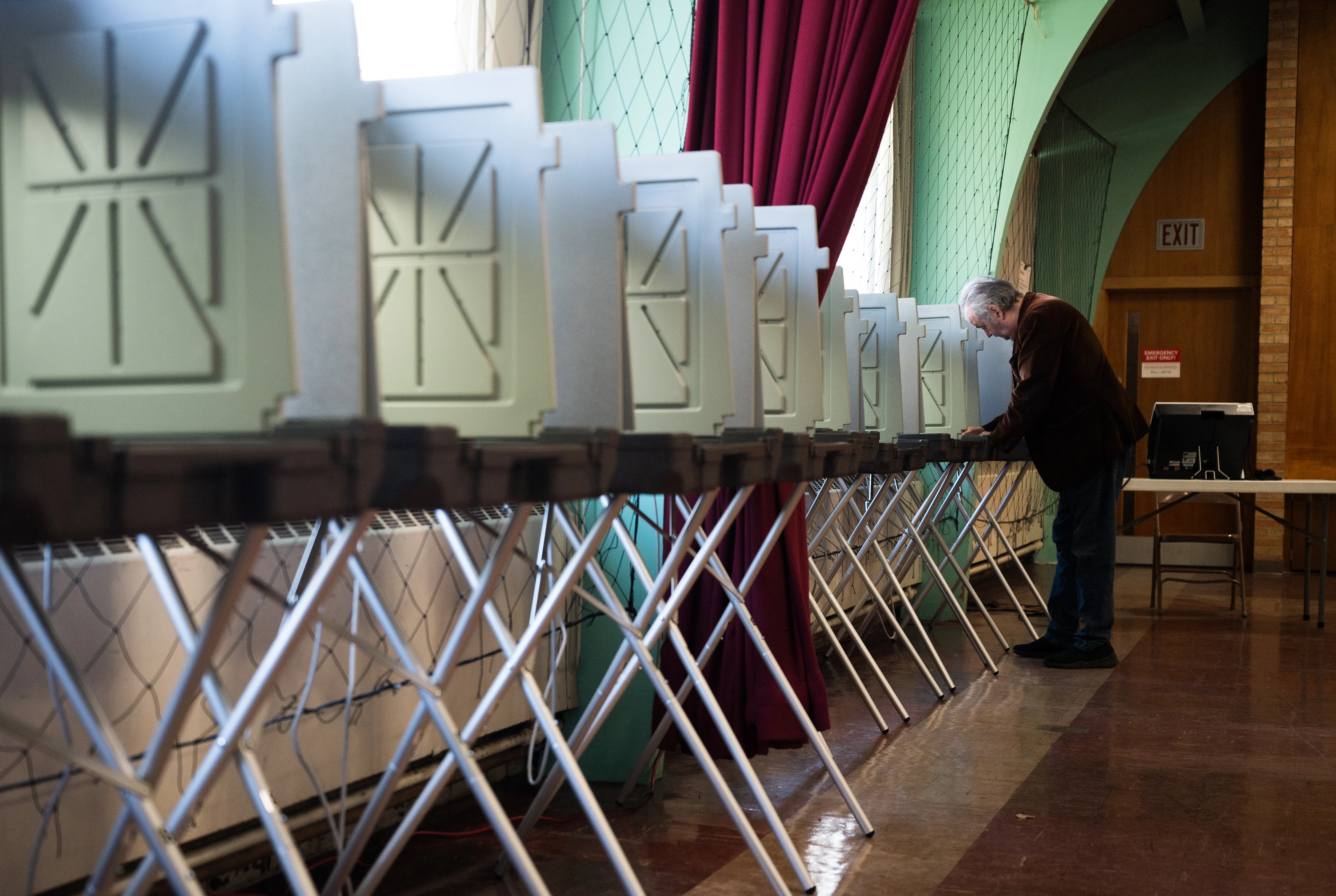 Voters fill out their ballots at an early voting polling place at Bethel Lutheran Church on October 28, 2026 in Minneapolis, Minn.