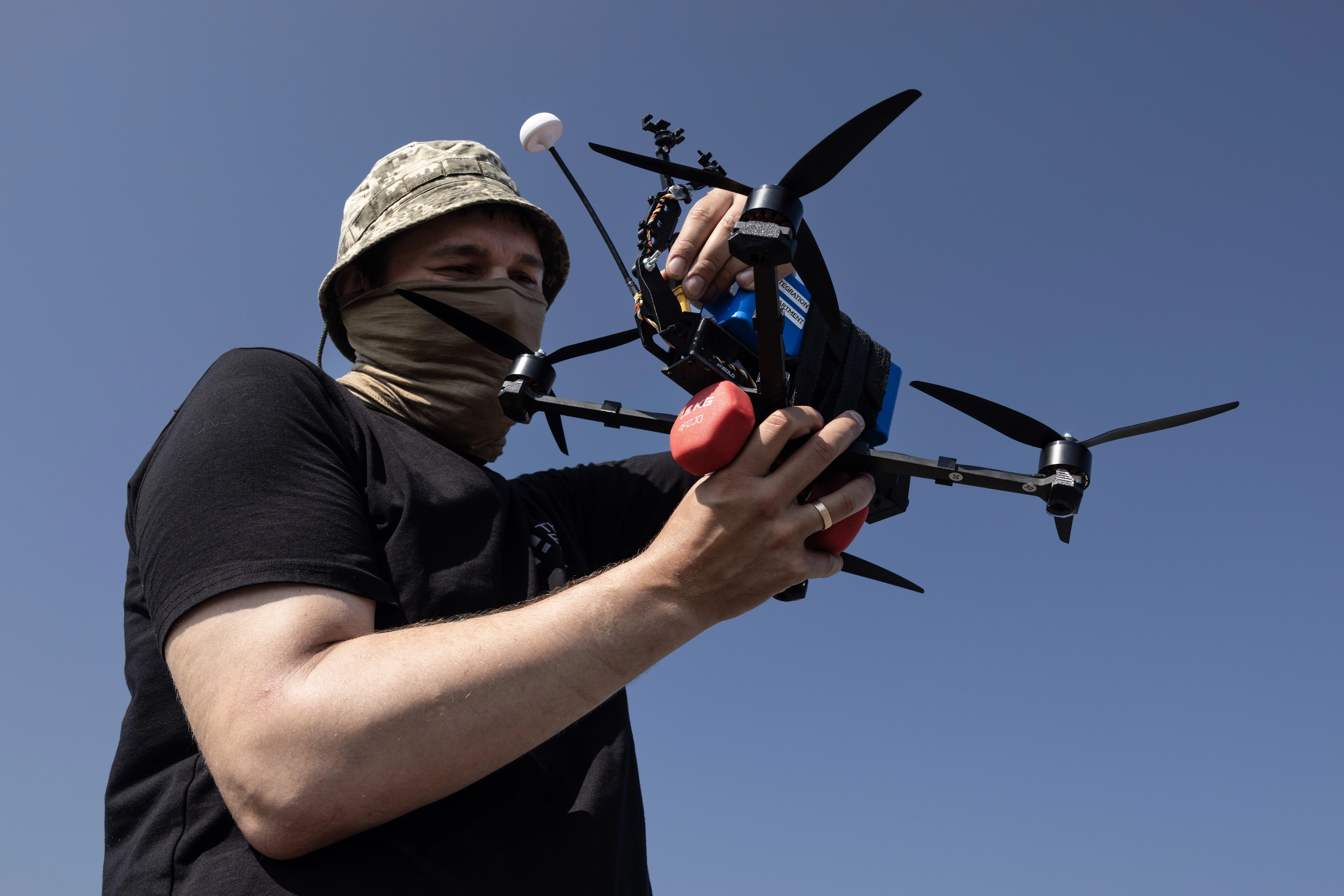A drone operator with the military call sign Professor operates a Lupynis-10-TFL-1 from The Fourth Law at a test site in central Ukraine.
