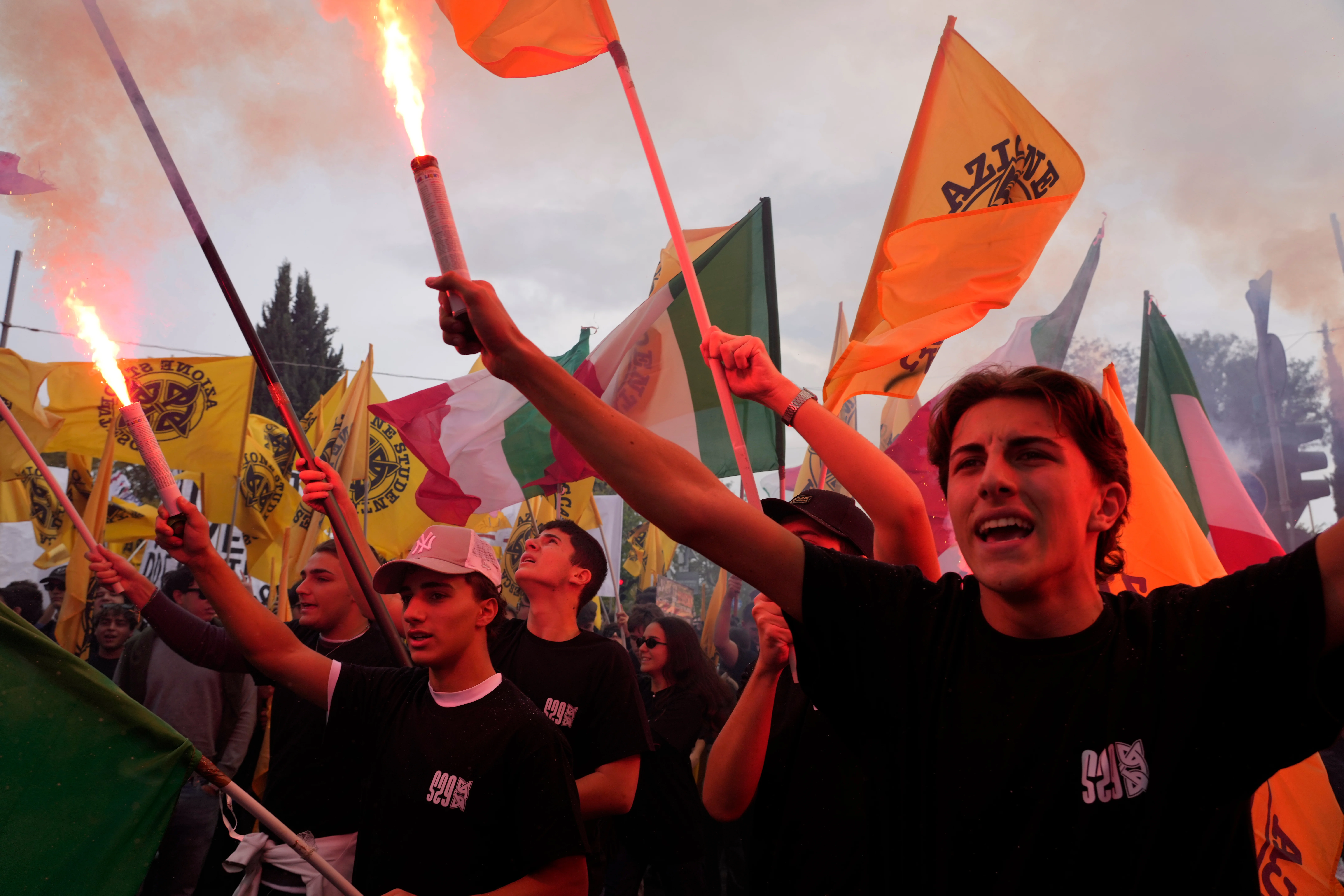 Members of right-wing student groups march through the streets of Rome, Saturday, Oct. 24, 2026, during a demonstration called "Unlock Everything," organized in opposition to recent left-wing student protests and one of several demonstrations held by groups across the political spectrum.