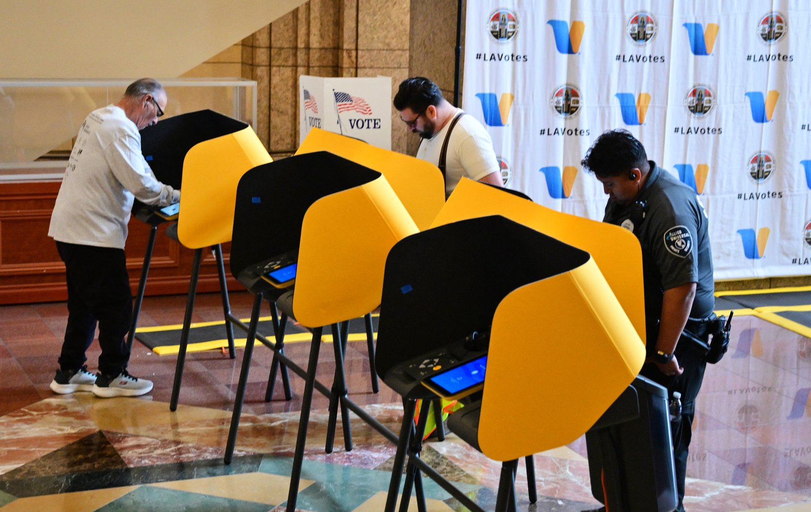 People vote at a polling location at the Metro Headquarters Building during California