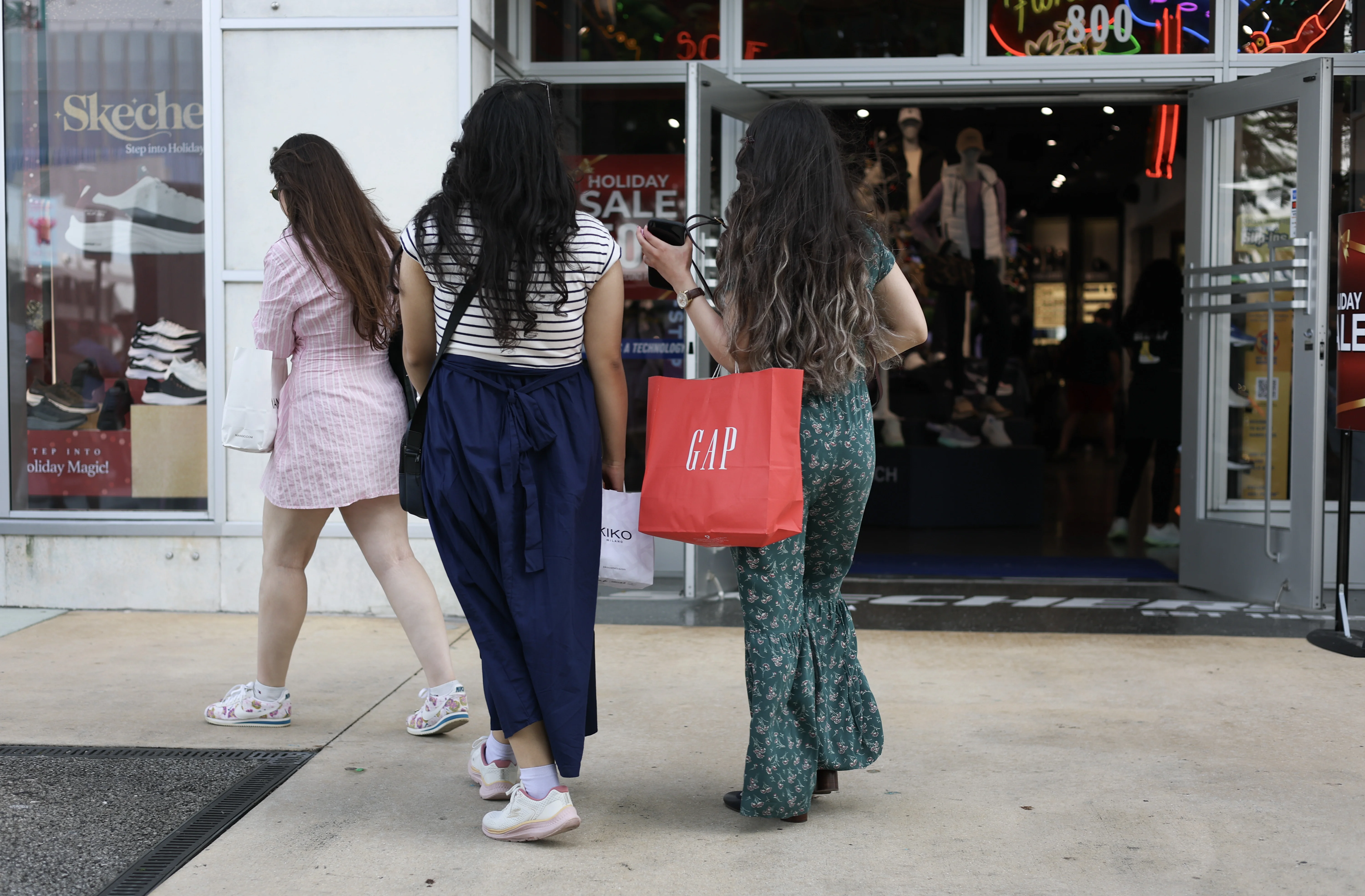 The U.S. economy grew 3.4% in the July to September quarter from a year earlier, a much faster pace of annual growth than in the second quarter. Consumer spending was one of the main drivers of growth — though many Americans continue to struggle with inflation.