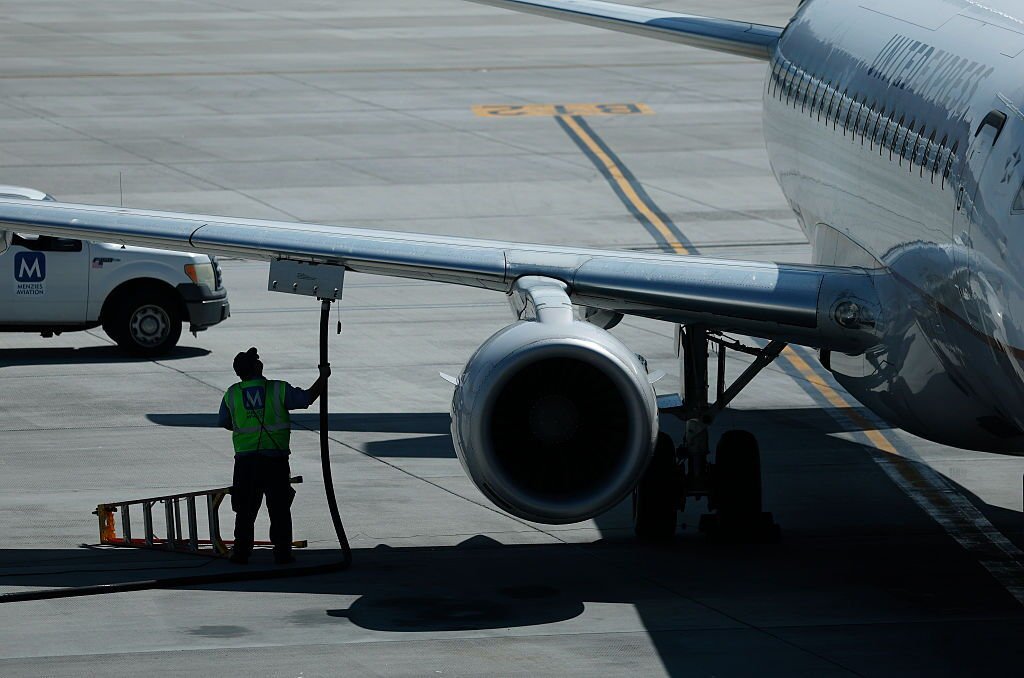 A worker fuels a United Airlines plane at Salt Lake City International Airport in April, 2026. The price of jet fuel, one of airlines