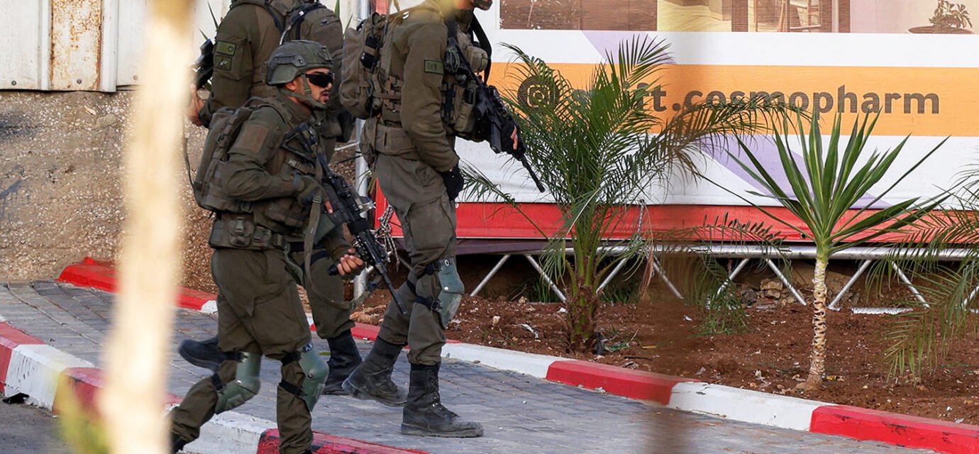Israel orders sweeping West Bank operation after military says 2 soldiers were killed in attack that left 2 gunmen dead