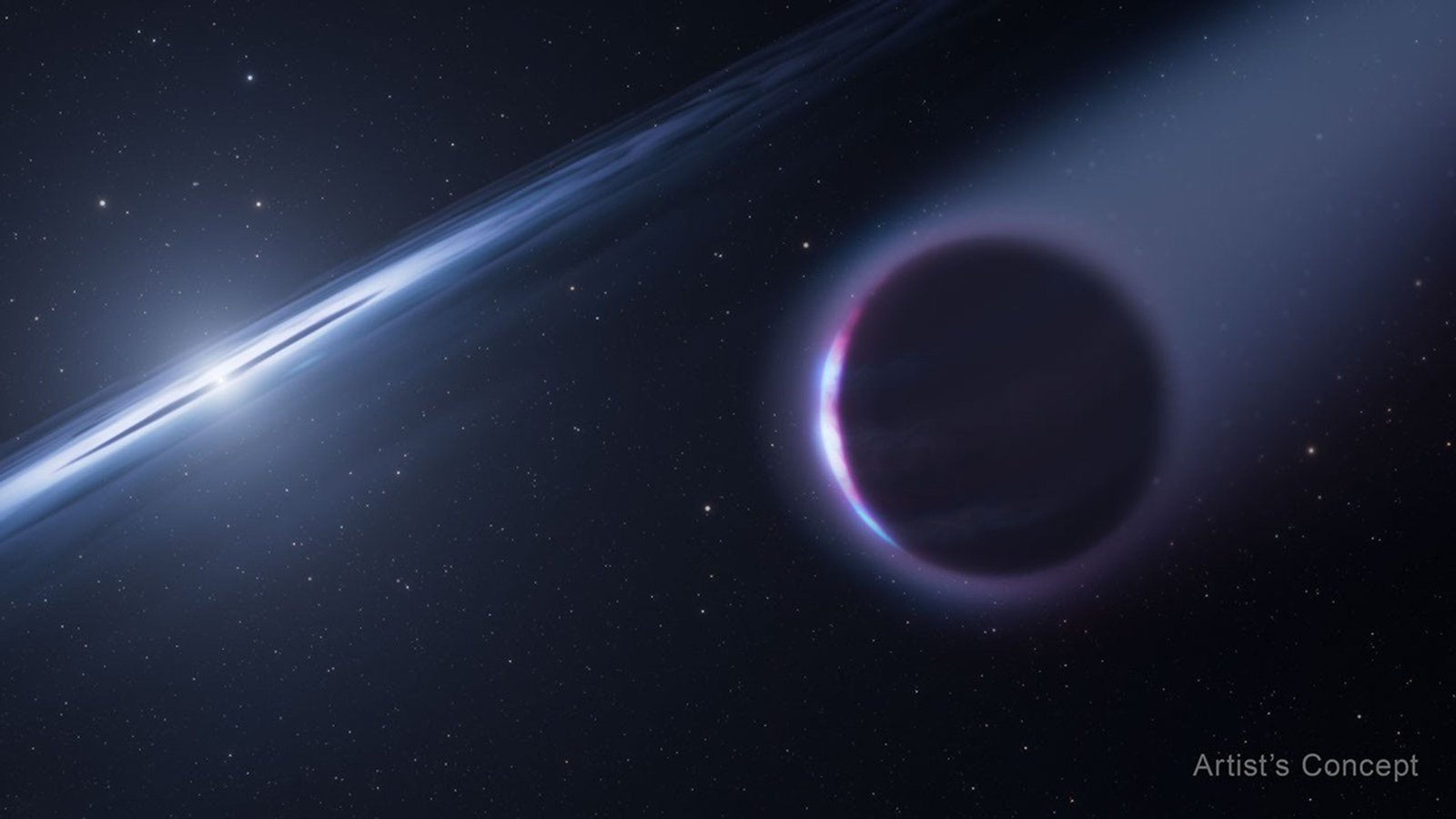 A gaseous planet in the right foreground, seen mostly in silhouette, orbits a small, white star in the background at left. The star is surrounded by a thin, bright white disk tilted from lower left to upper right. A semi-transparent tail of material comes off the planet toward upper right. Distant stars dot the black background of space.